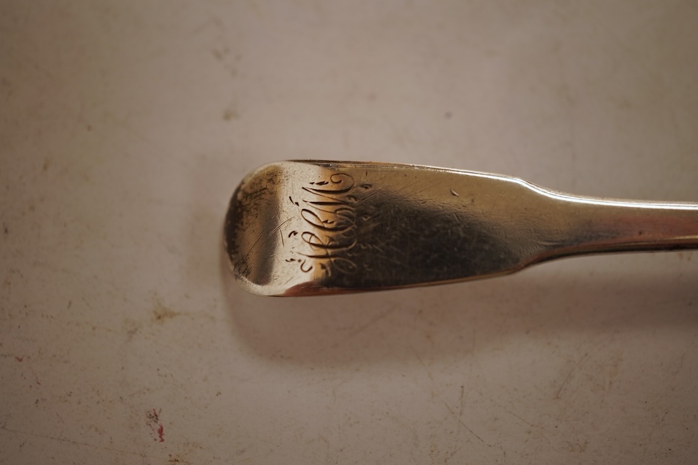 A small collection of nine assorted Georgian and later small silver or white metal spoons, including mustard ladles and other condiment spoons, a caddy spoon, London, 1799, together with a 19th century Russian 84 zolotni